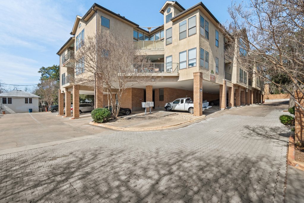 1910 Robbins Place, Unit 106 Austin, TX 78705 - Photo 4 of 20 a view of a building with a street