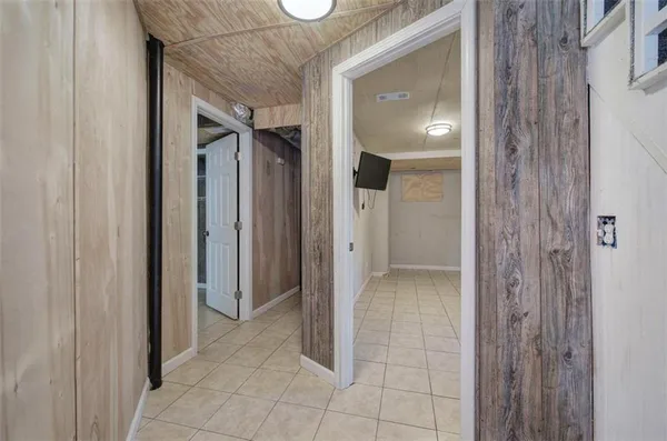 a view of a bathroom with a glass door and shower