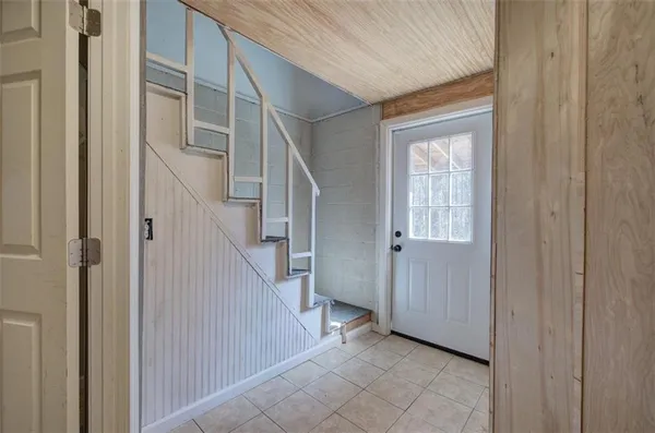 a view of an entryway with staircase