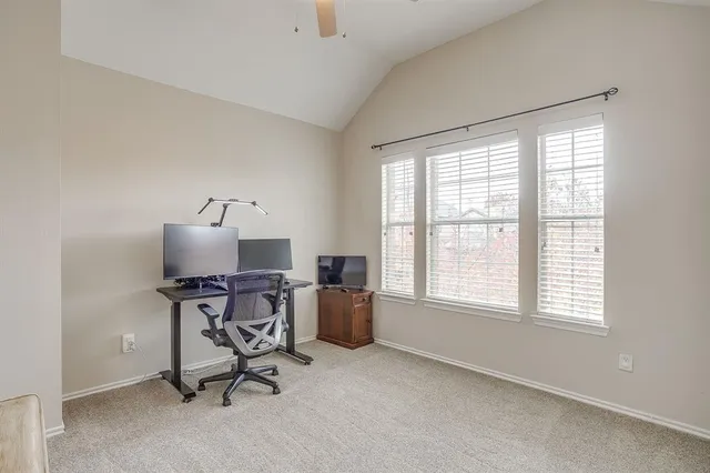 a bathroom with a sink a toilet a mirror and shower curtain