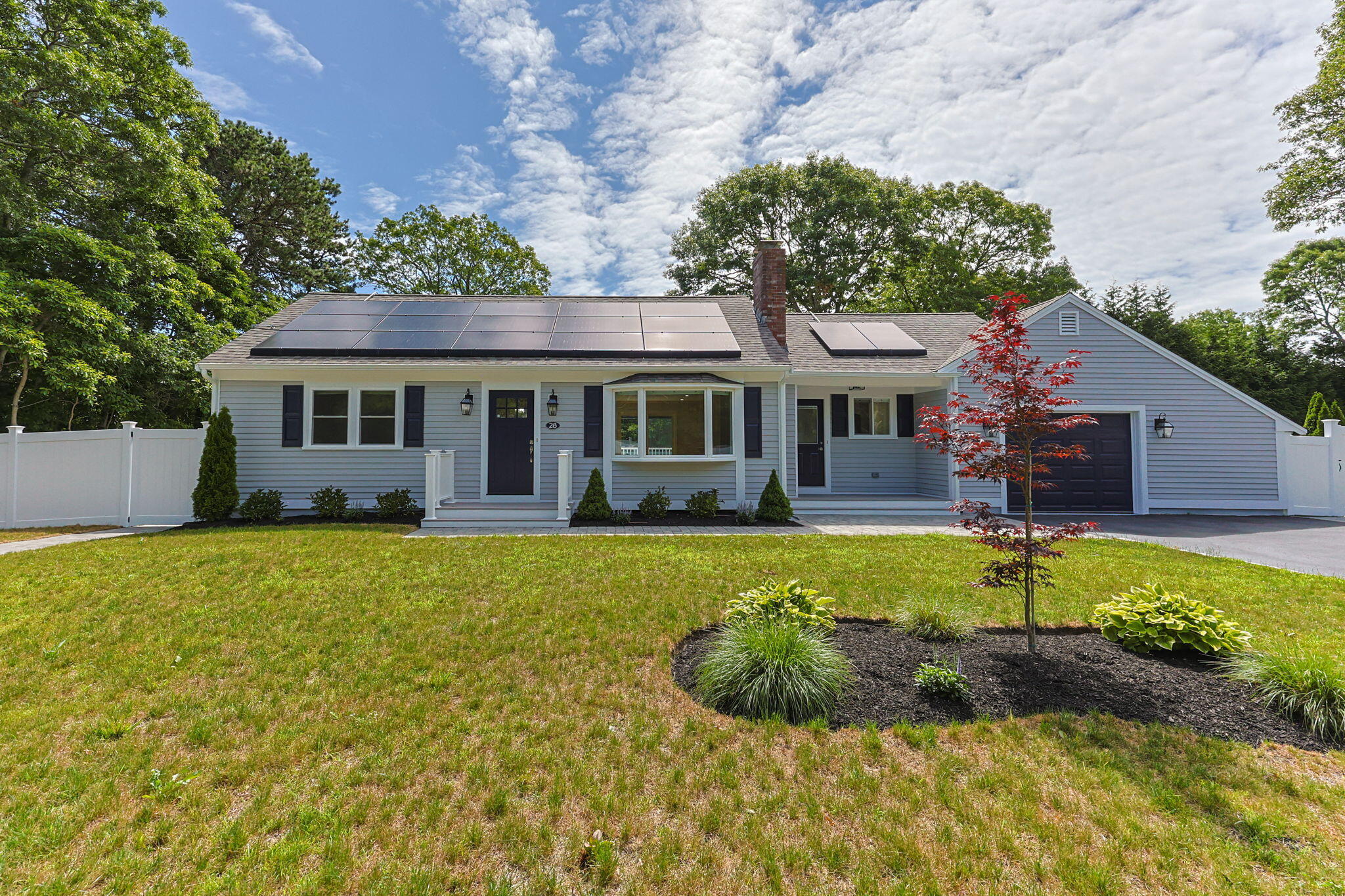 28 Vandermint Lane Hyannis, MA 02601 - Photo 1 of 47 a front view of a house with a yard