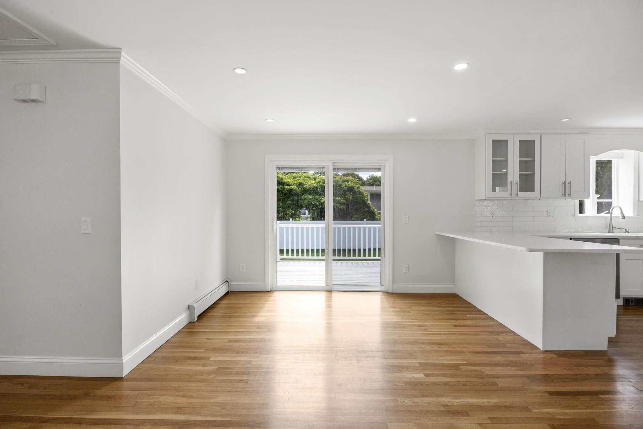 28 Vandermint Lane Hyannis, MA 02601 - Photo 13 of 47 a view of a kitchen with a sink and dishwasher with wooden floor