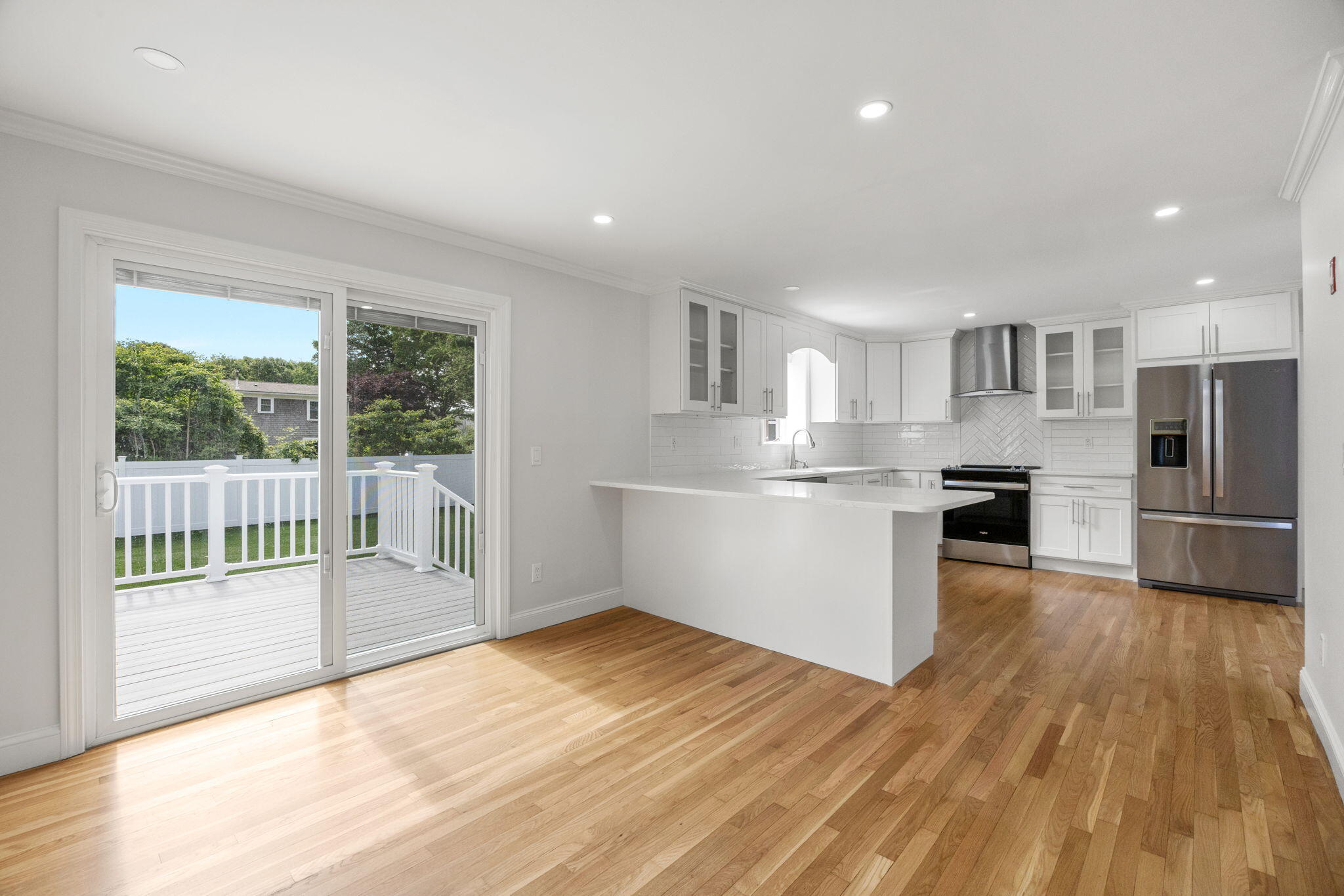 28 Vandermint Lane Hyannis, MA 02601 - Photo 14 of 47 a view of a kitchen with a sink and an oven