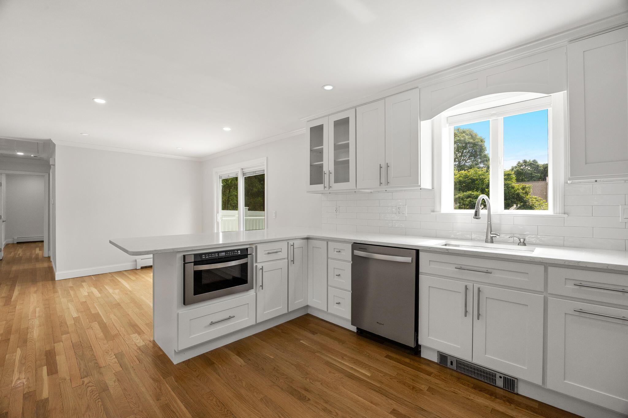 28 Vandermint Lane Hyannis, MA 02601 - Photo 18 of 47 a kitchen with a sink and a stove top oven