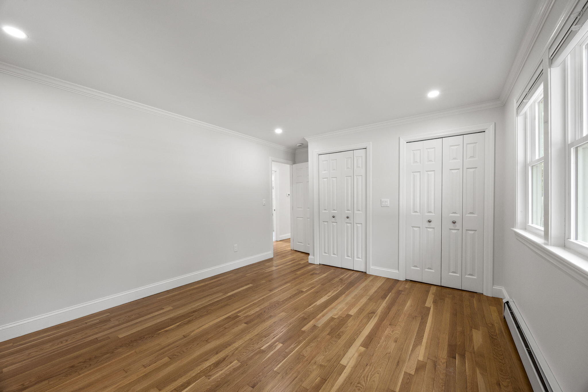 28 Vandermint Lane Hyannis, MA 02601 - Photo 25 of 47 a view of an empty room and wooden floor