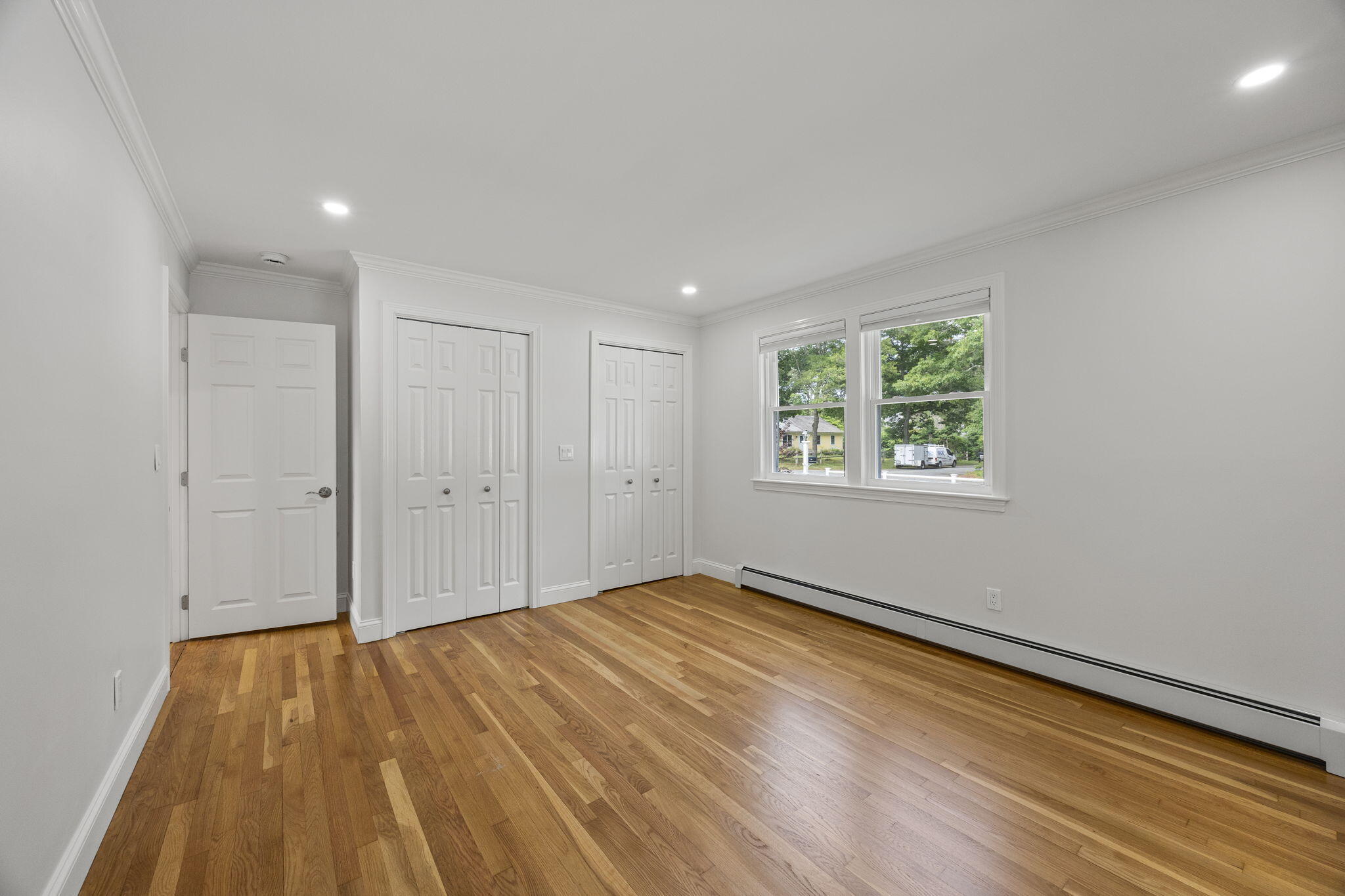 28 Vandermint Lane Hyannis, MA 02601 - Photo 26 of 47 a view of an empty room with wooden floor and a window