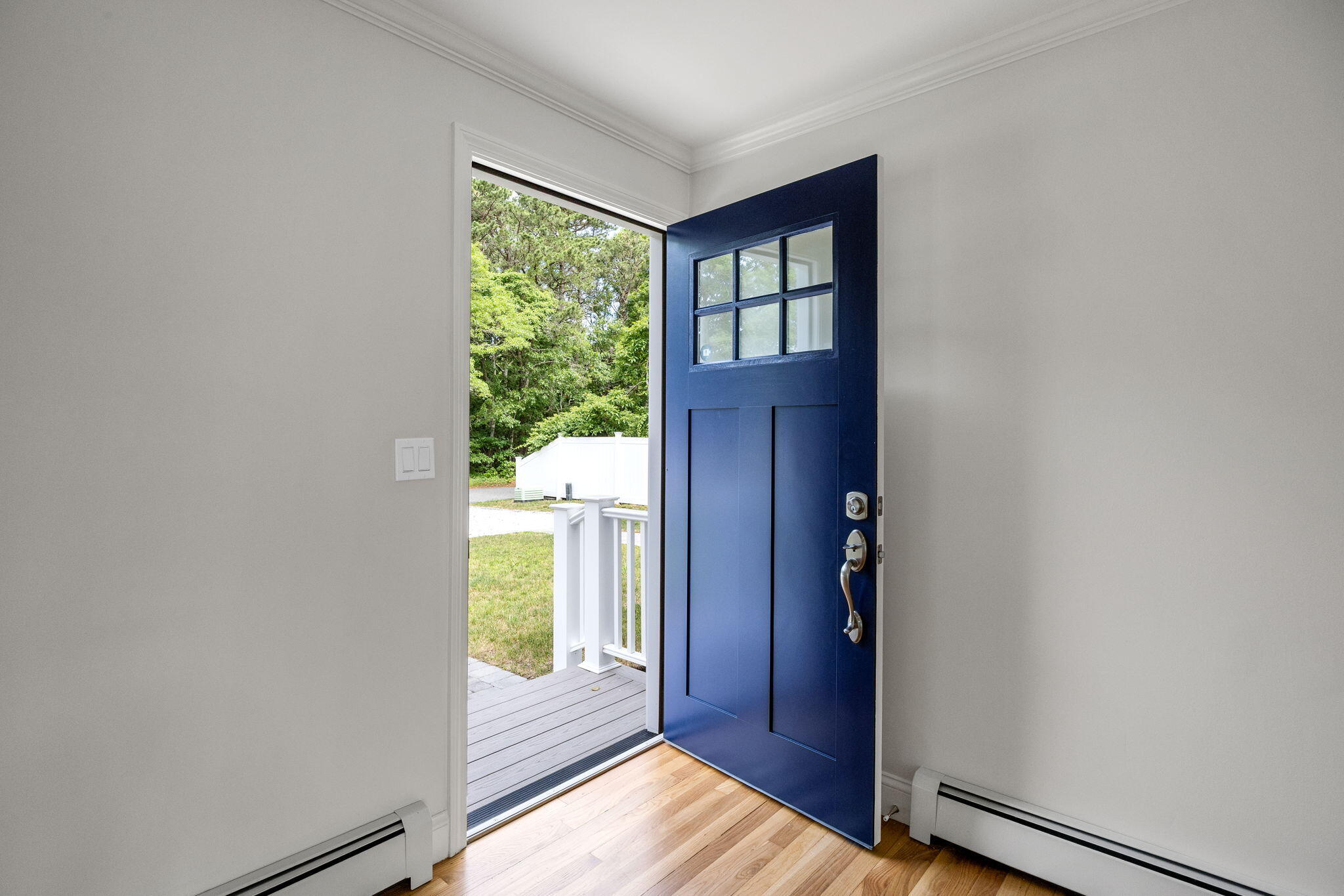28 Vandermint Lane Hyannis, MA 02601 - Photo 9 of 47 a view of a bedroom with wooden floor and windows