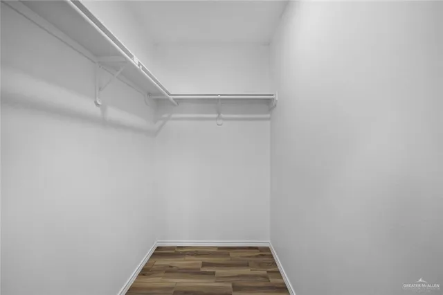 a view of a room with white racks