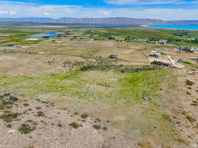 160 Dry Canyon St. Charles, ID 83272 - Photo 51 of 63 Expansive land parcel featuring natural topography, distant mountain ranges, and a visible body of water