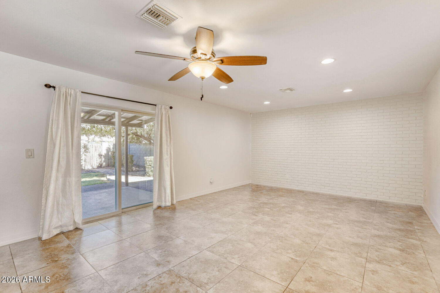 2030 East Colgate Drive Tempe, AZ 85283 - Photo 13 of 26 an empty room with fan and windows