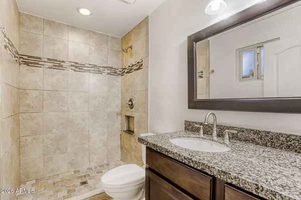 a utility room with cabinets