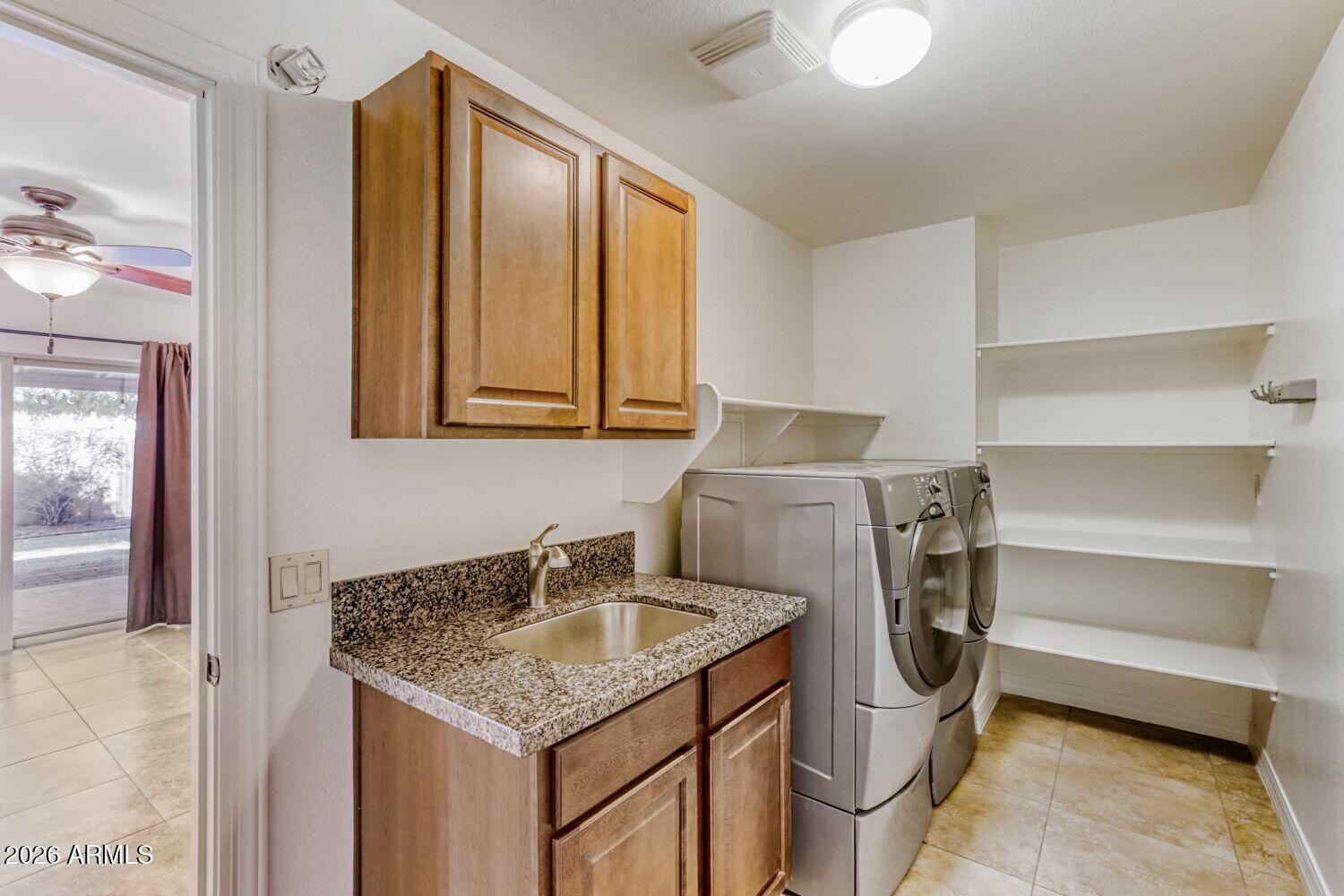 2030 East Colgate Drive Tempe, AZ 85283 - Photo 23 of 26 a utility room with cabinets
