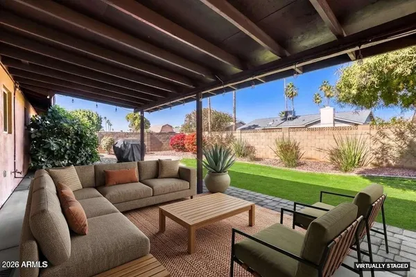 a view of a backyard of the house