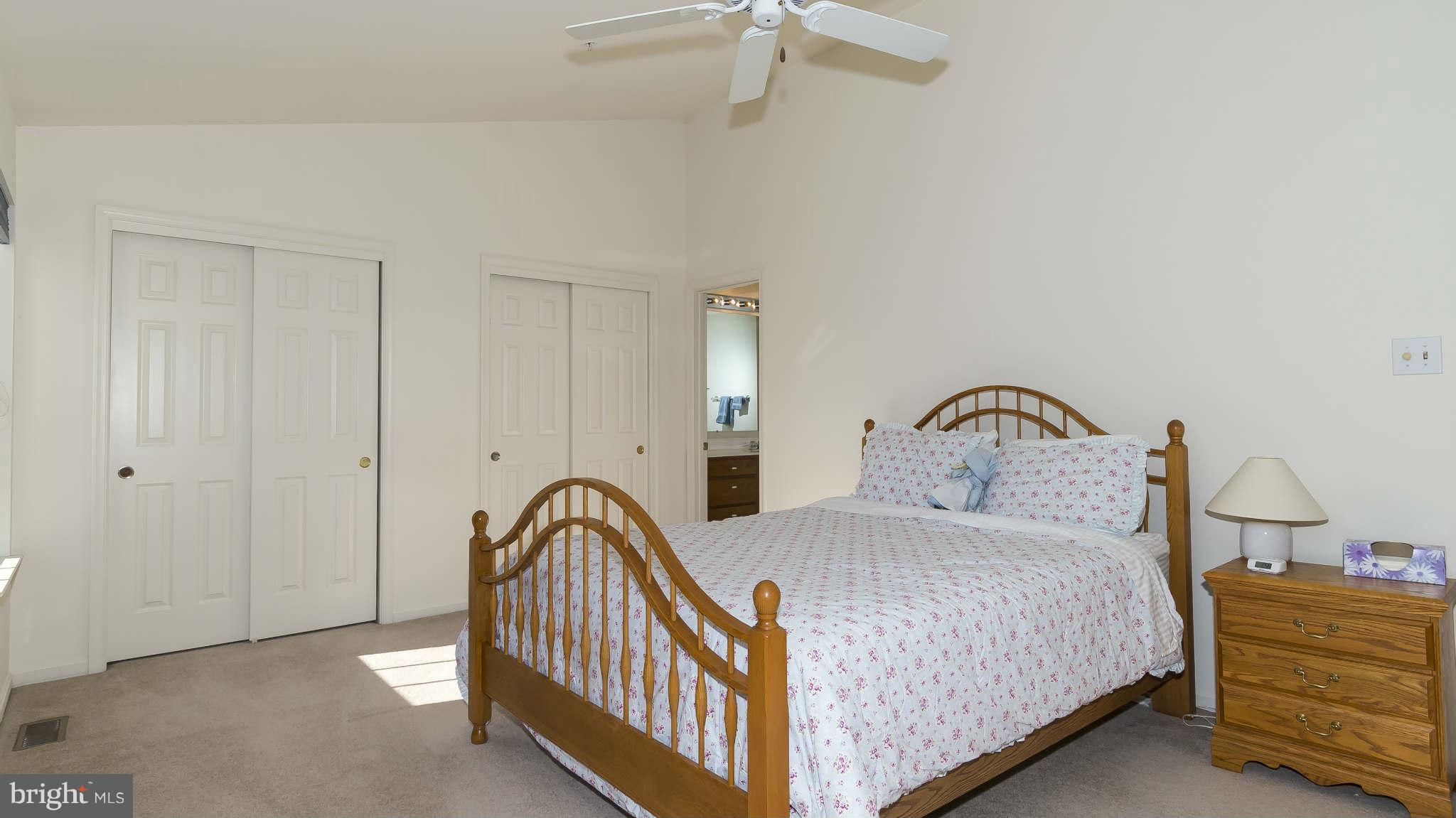 12200 Bare Bush Path Columbia, MD 21044 - Photo 14 of 30 a bedroom with bed and a window