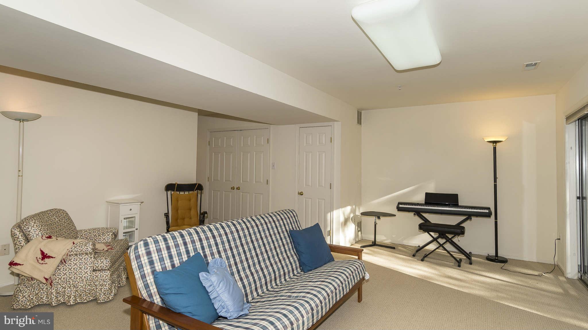 12200 Bare Bush Path Columbia, MD 21044 - Photo 23 of 30 a bedroom with furniture and a window