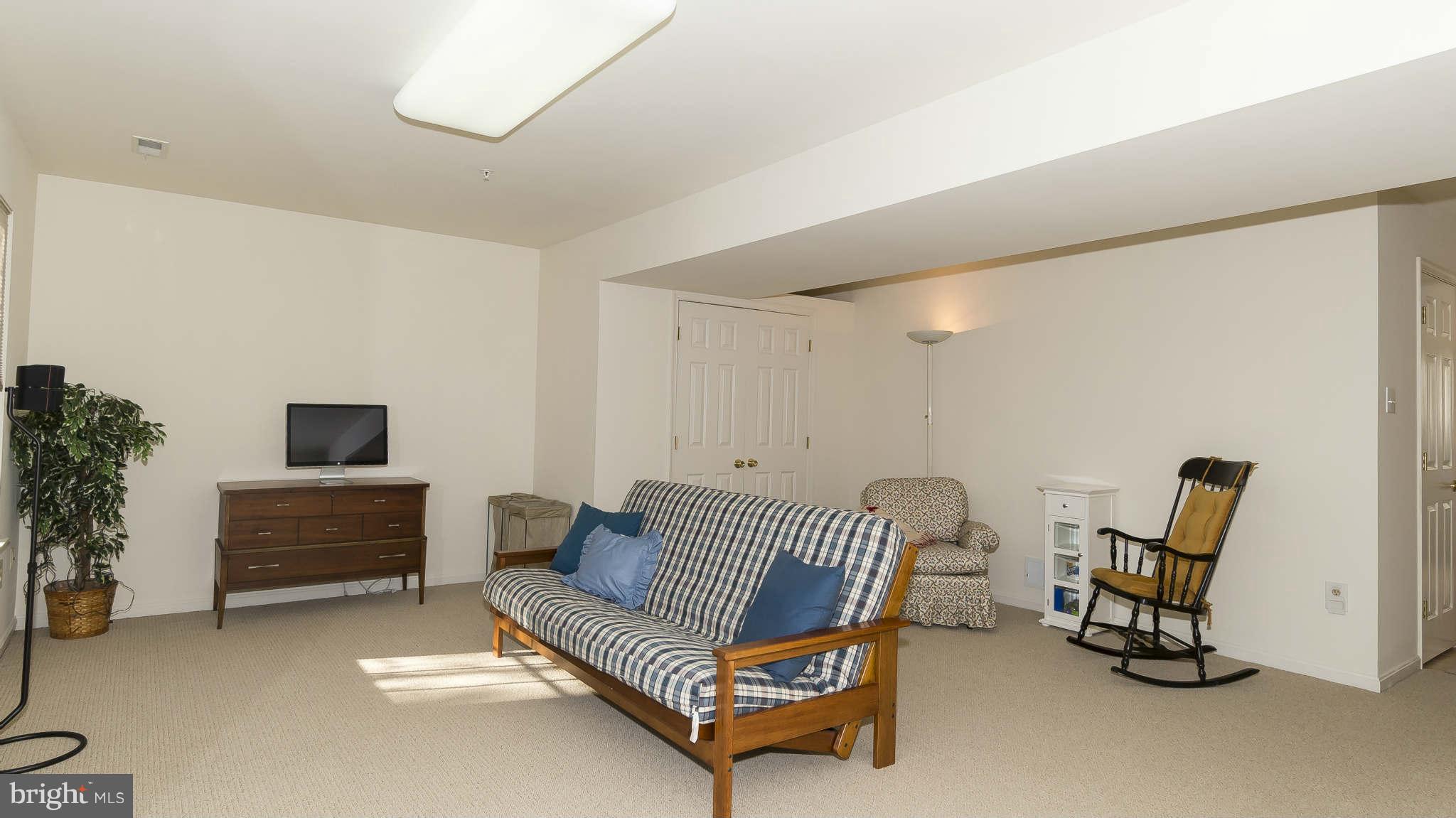 12200 Bare Bush Path Columbia, MD 21044 - Photo 25 of 30 a living room with furniture