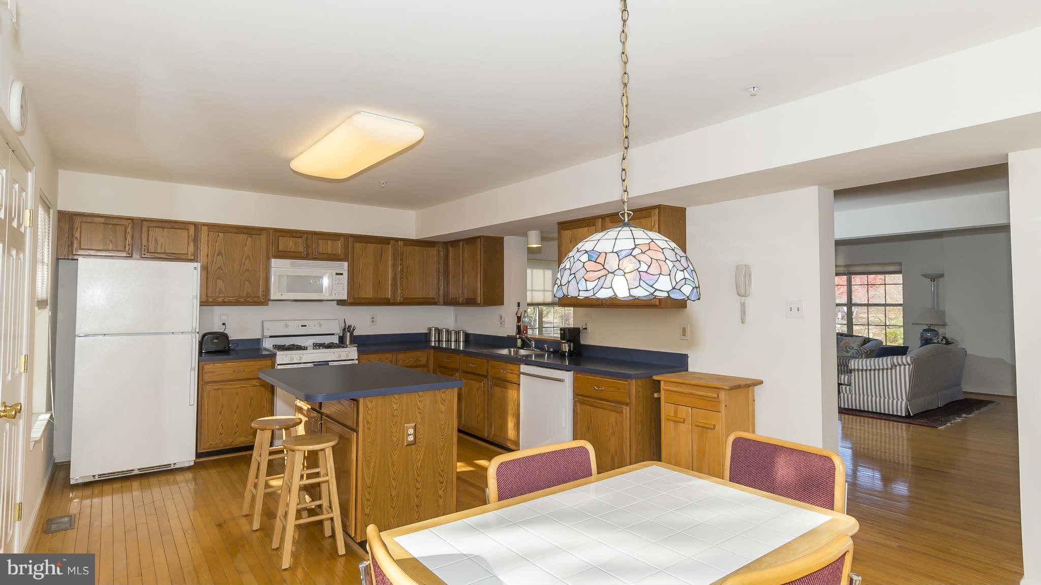 12200 Bare Bush Path Columbia, MD 21044 - Photo 10 of 30 a very nice looking dining room with a table and chairs