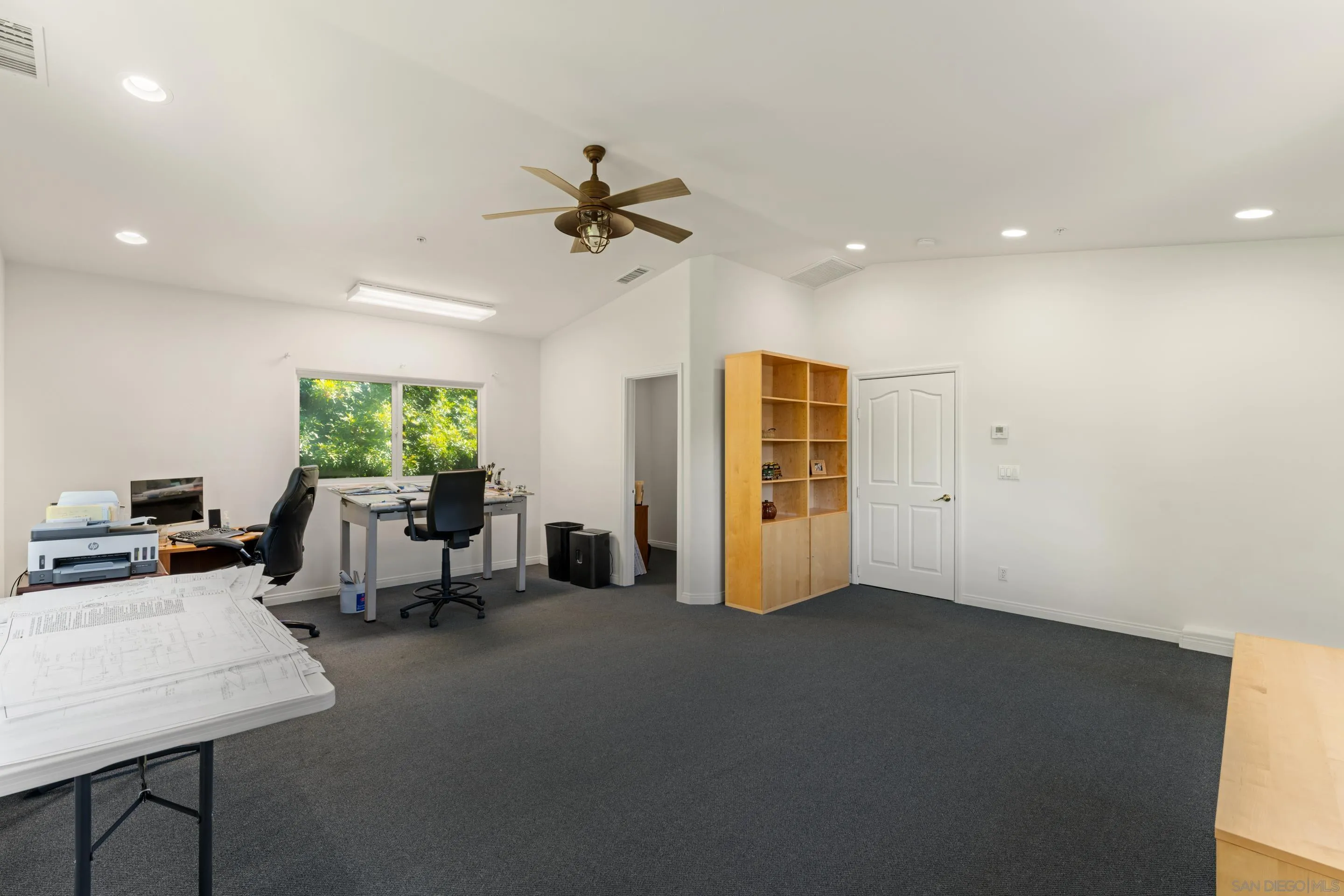 16611 Orchard Bend Road Poway, CA 92064 - Photo 39 of 59 a view of a livingroom with furniture and a ceiling fan