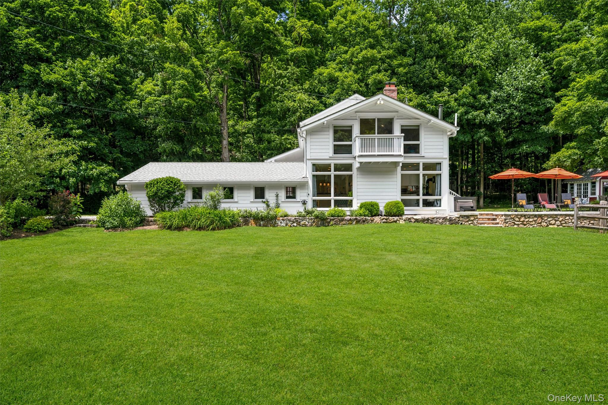 324 Haverstraw Road Suffern, NY 10901 - Photo 40 of 50 a front view of a house with garden
