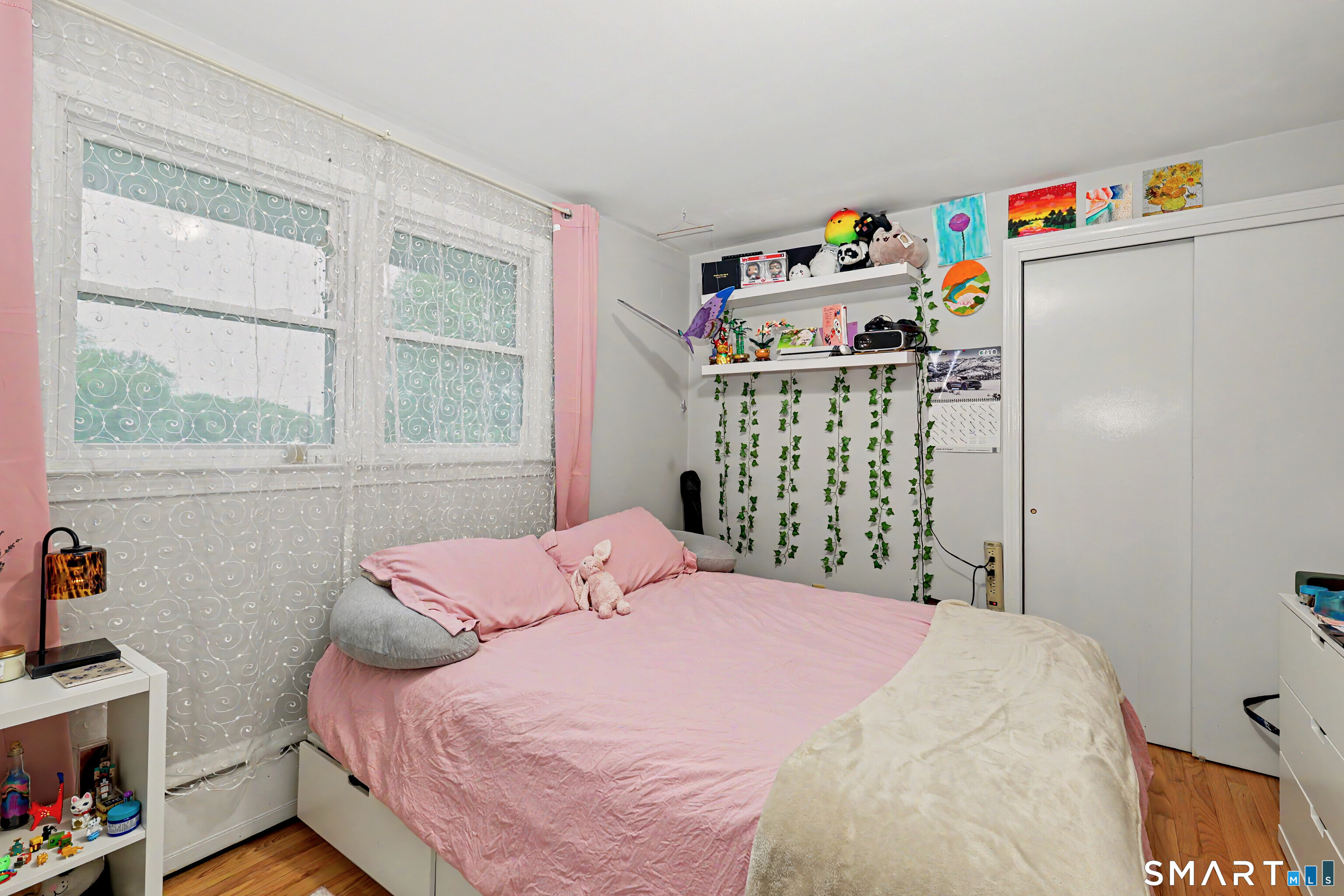 44 Haverhill Road Trumbull, CT 06611 - Photo 17 of 32 a bedroom with a bed and a window