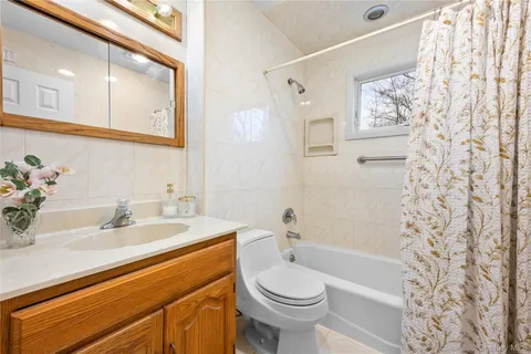 a bedroom with a bed and a table in it