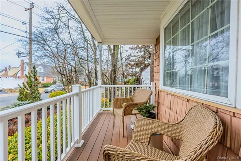 a view of balcony with furniture
