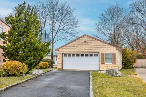 a picture of a room with a white wall and a picture