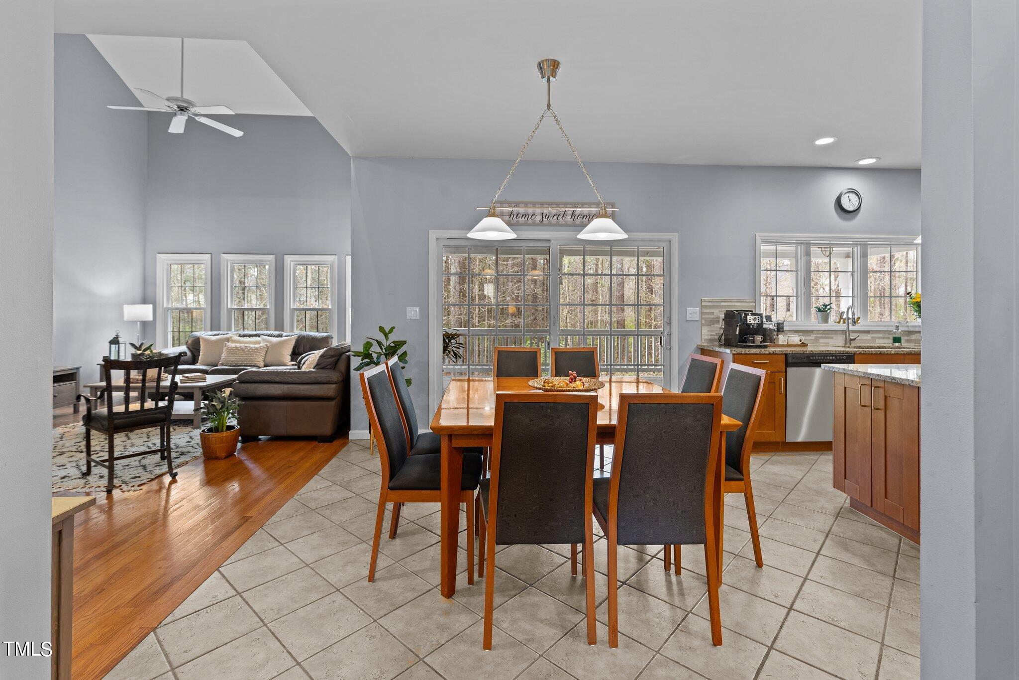 103 Summerglow Court Cary, NC 27513 - Photo 18 of 67 a view of a dining room with furniture window and wooden floor