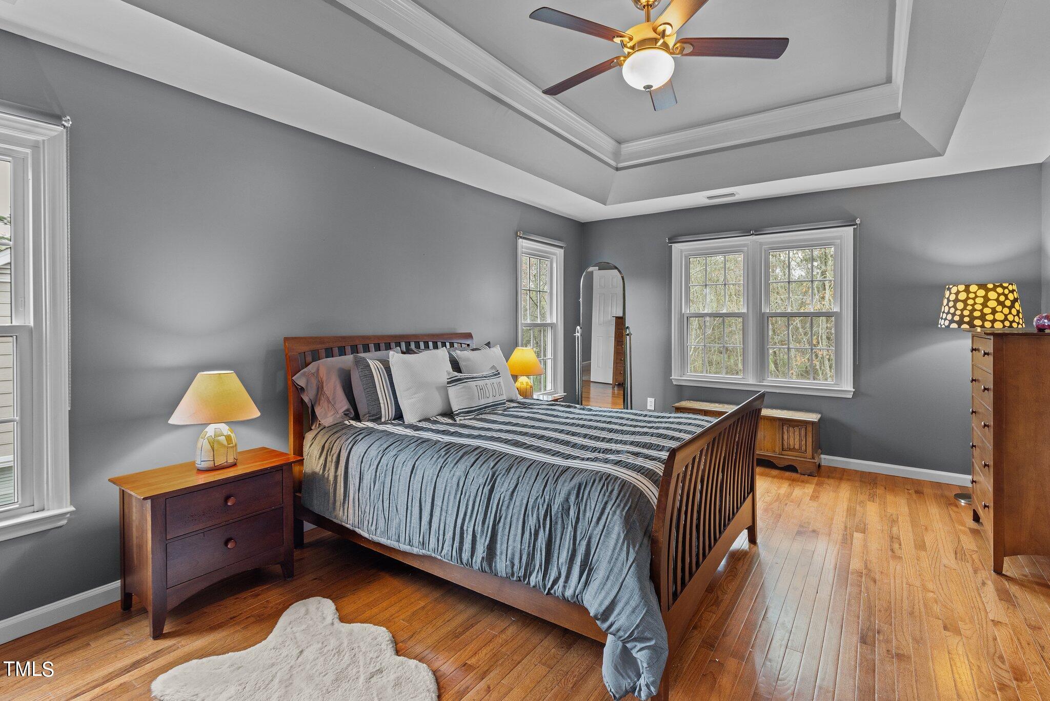 103 Summerglow Court Cary, NC 27513 - Photo 29 of 67 a bedroom with a bed and window