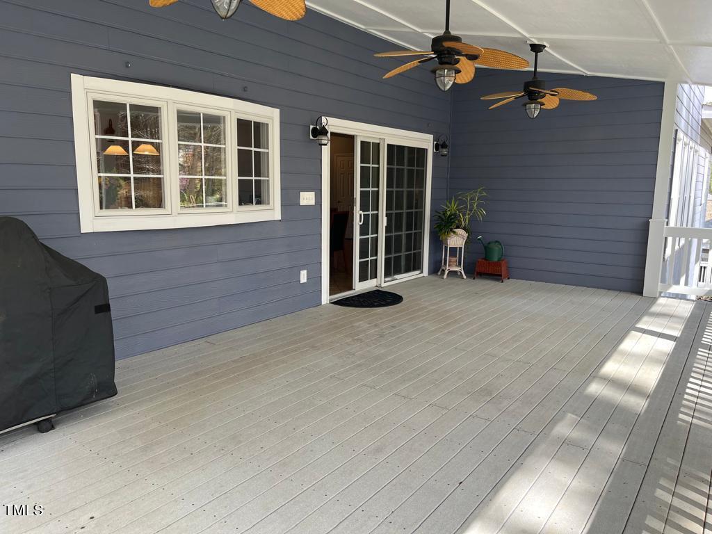 103 Summerglow Court Cary, NC 27513 - Photo 50 of 67 a view of a house with a balcony