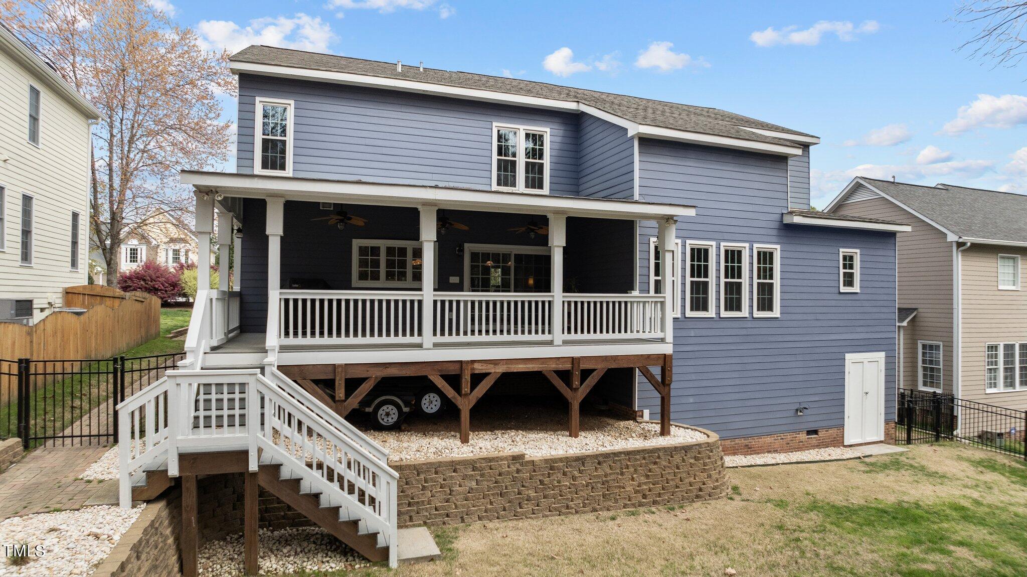 103 Summerglow Court Cary, NC 27513 - Photo 55 of 67 a view of residential house with wooden fence