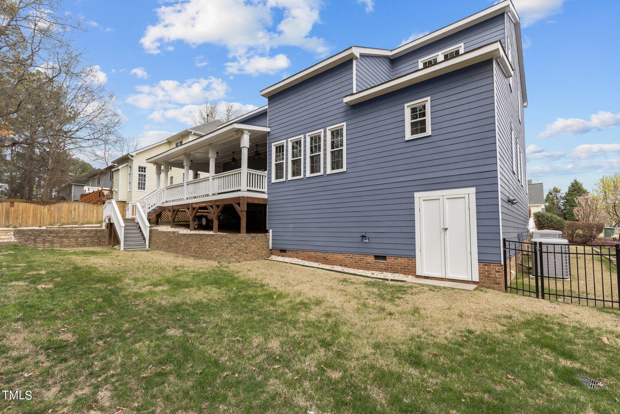 103 Summerglow Court Cary, NC 27513 - Photo 57 of 67 a front view of a house with a yard