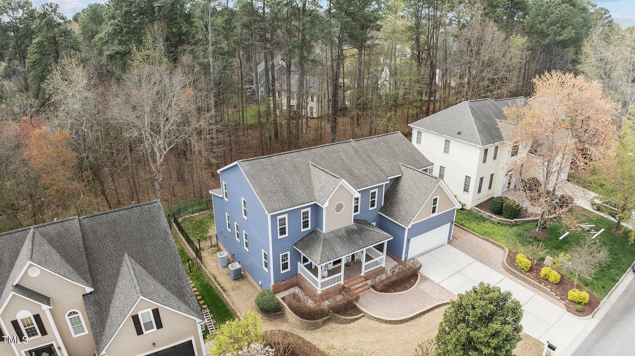 103 Summerglow Court Cary, NC 27513 - Photo 62 of 67 an aerial view of a house with backyard and outdoor space
