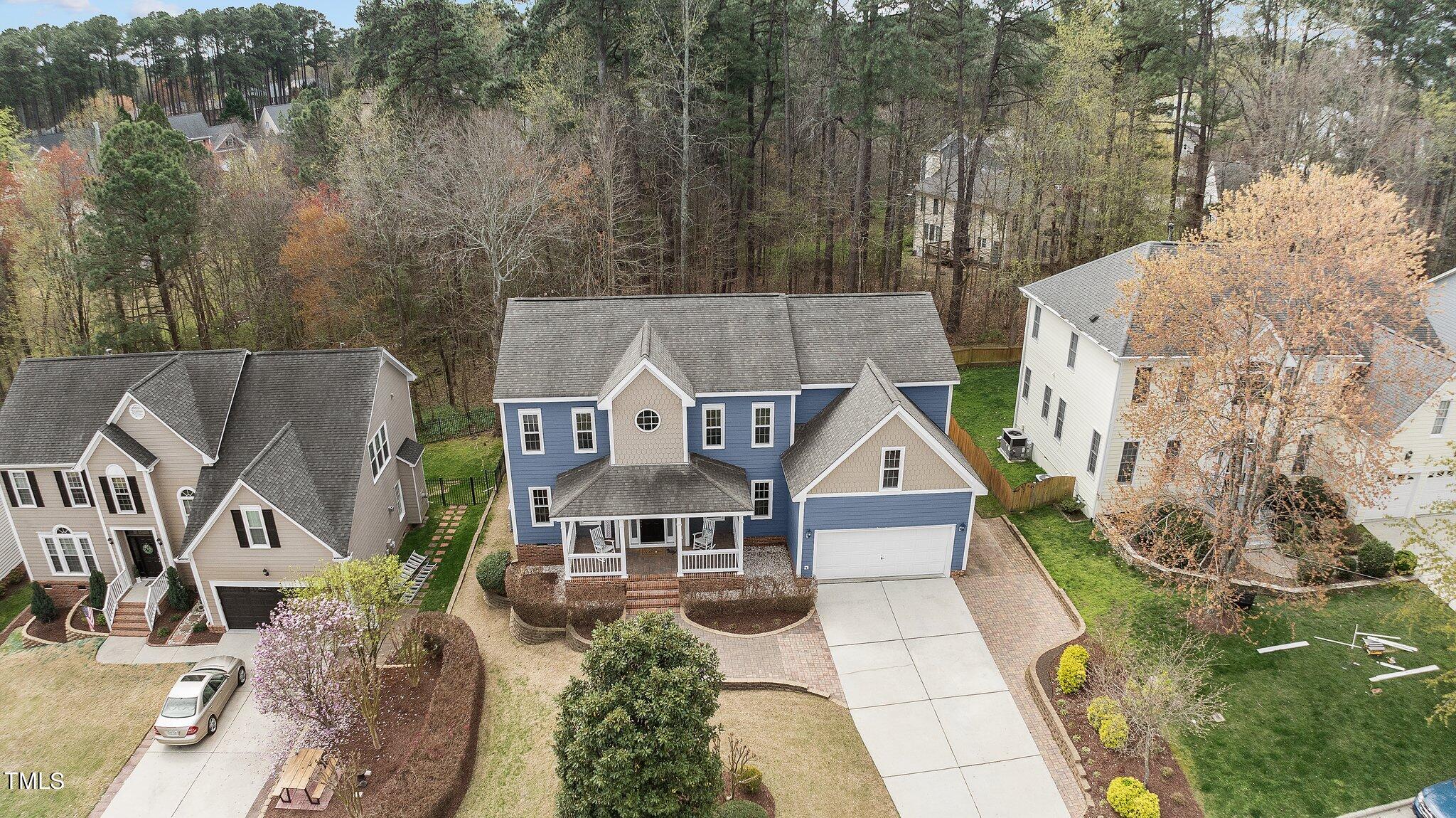 103 Summerglow Court Cary, NC 27513 - Photo 63 of 67 an aerial view of a house with a yard