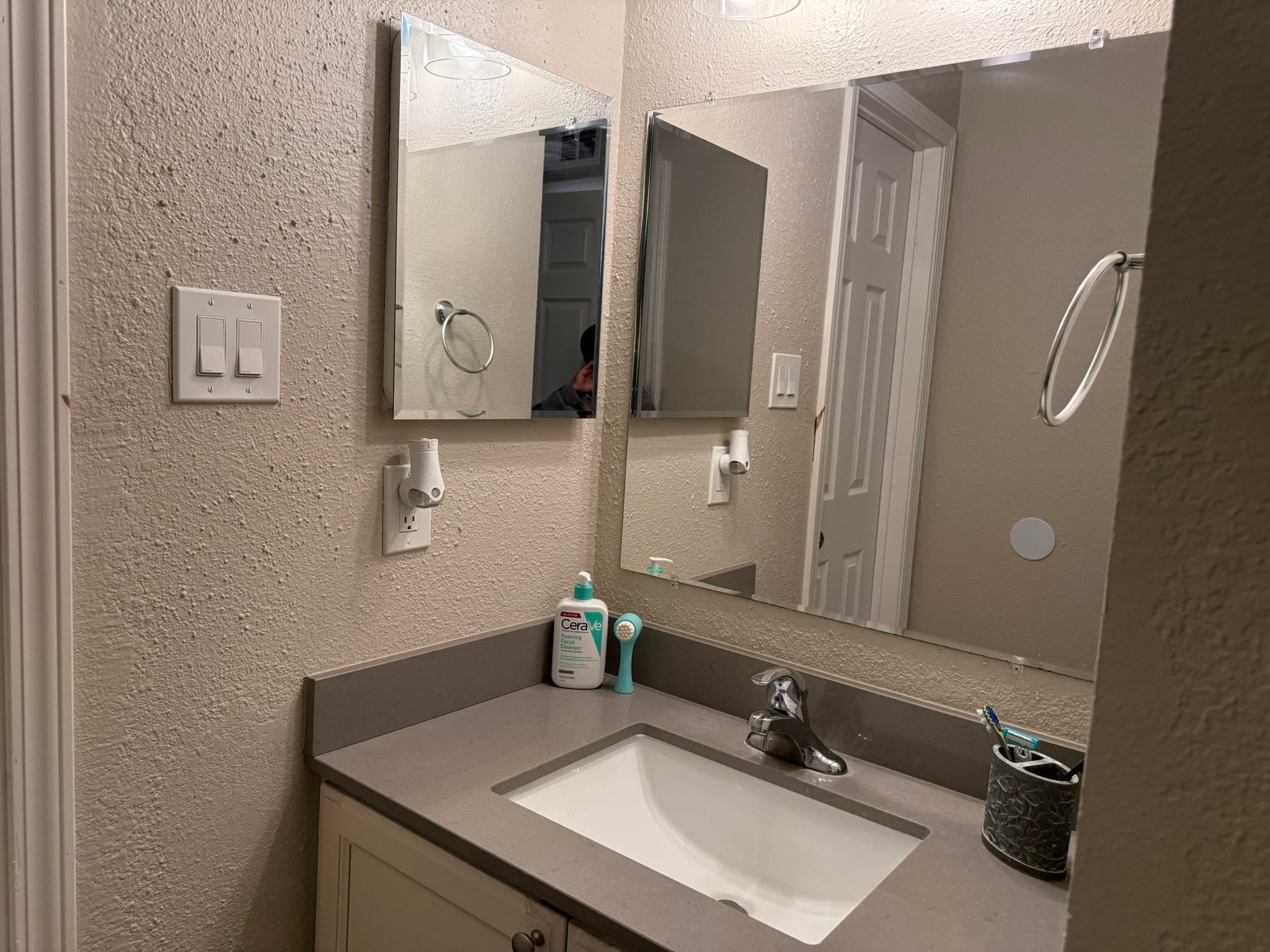16303 Lyons School Road, Unit 907 Spring, TX 77379 - Photo 11 of 21 a bathroom with a sink and a mirror