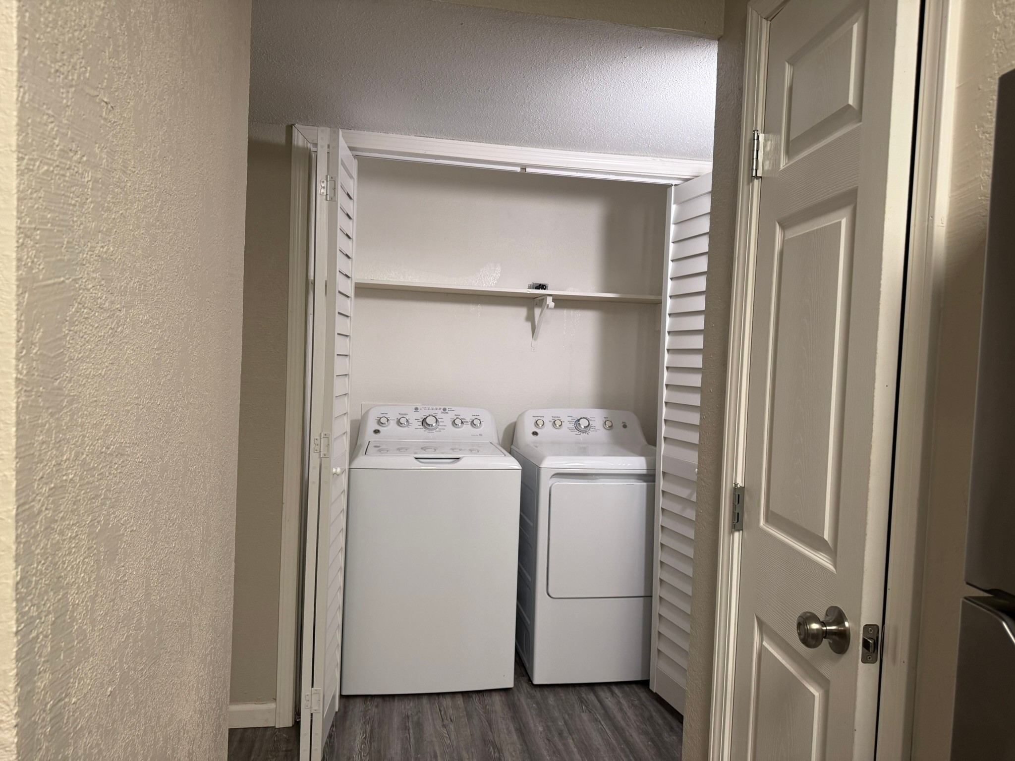 16303 Lyons School Road, Unit 907 Spring, TX 77379 - Photo 19 of 21 a utility room with dryer and washer