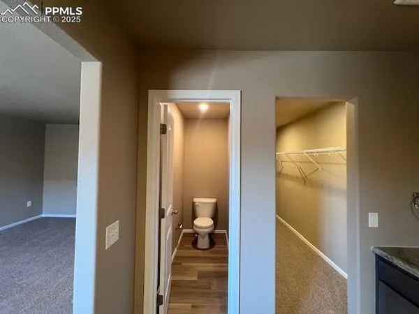 a bathroom with a tub and shower