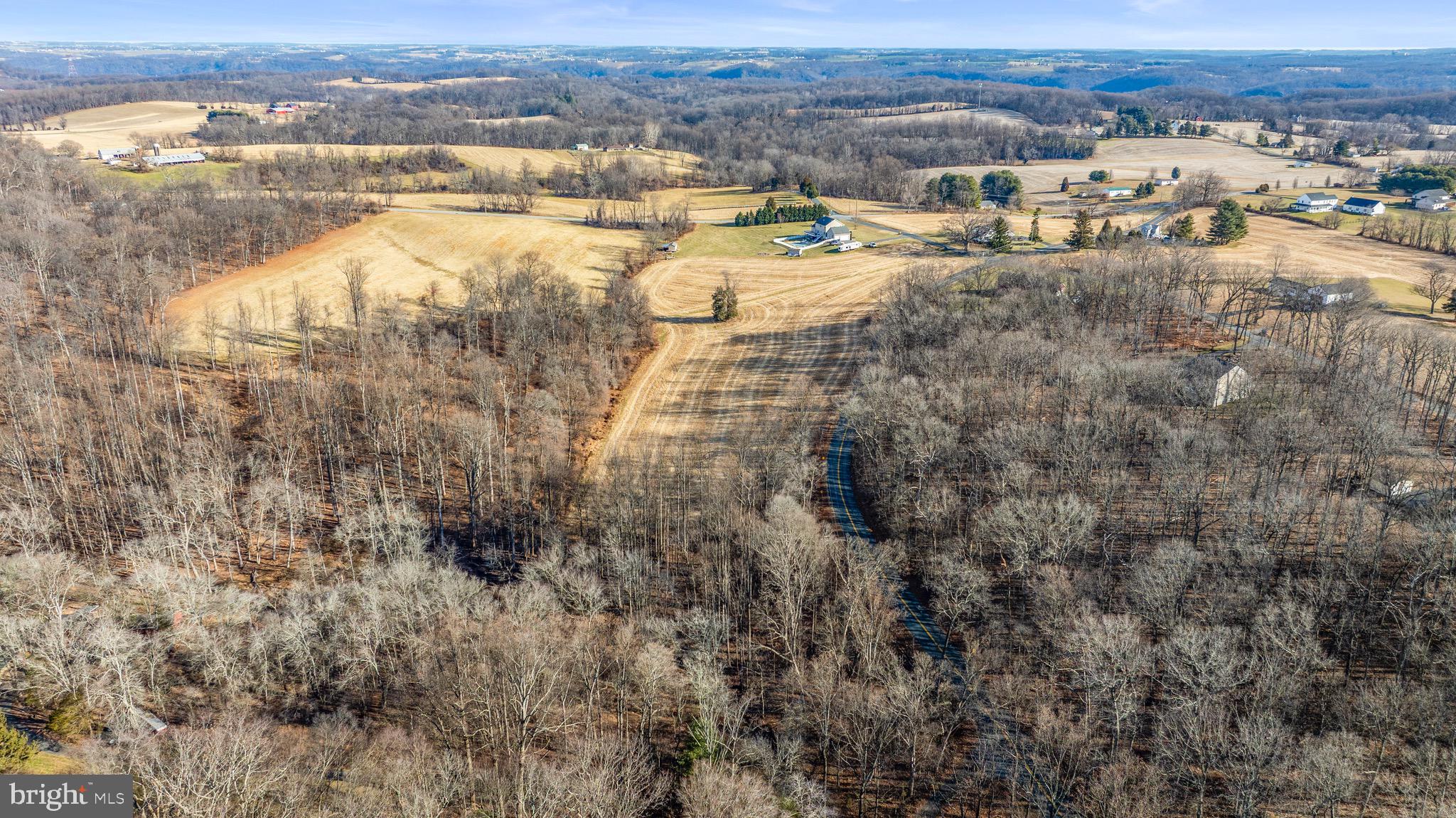1914 Deep Run Road Whiteford, MD 21160 - Photo 5 of 10 a view of a lake with mountains in the background
