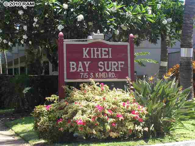 715 South Kihei Road, Unit 226 Kihei, HI 96753 - Photo 1 of 26 a sign that is in front of flowers