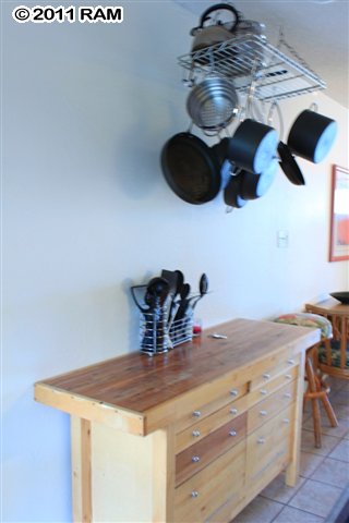 715 South Kihei Road, Unit 226 Kihei, HI 96753 - Photo 13 of 26 a close view of shoes stand and cabinets
