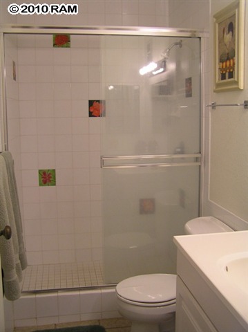 715 South Kihei Road, Unit 226 Kihei, HI 96753 - Photo 16 of 26 a bathroom with a shower and a toilet