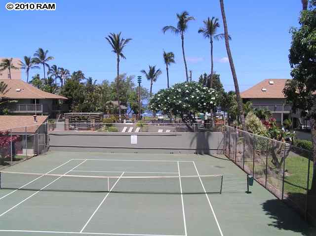 715 South Kihei Road, Unit 226 Kihei, HI 96753 - Photo 20 of 26 a view of a patio with a table and chairs