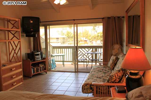 715 South Kihei Road, Unit 226 Kihei, HI 96753 - Photo 7 of 26 a living room with furniture and a flat screen tv
