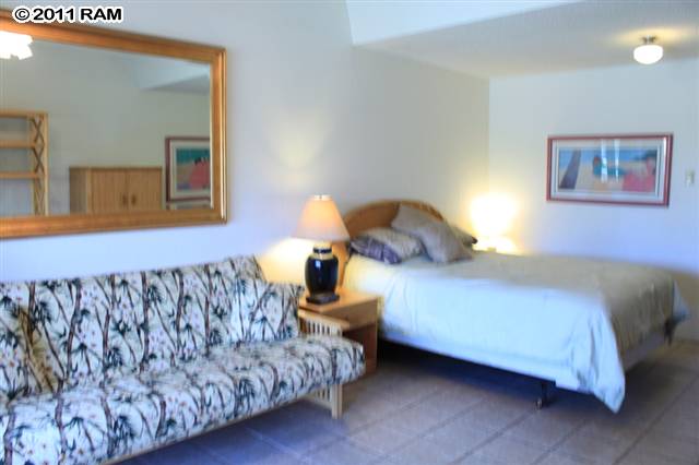 715 South Kihei Road, Unit 226 Kihei, HI 96753 - Photo 8 of 26 a bedroom with a bed and window