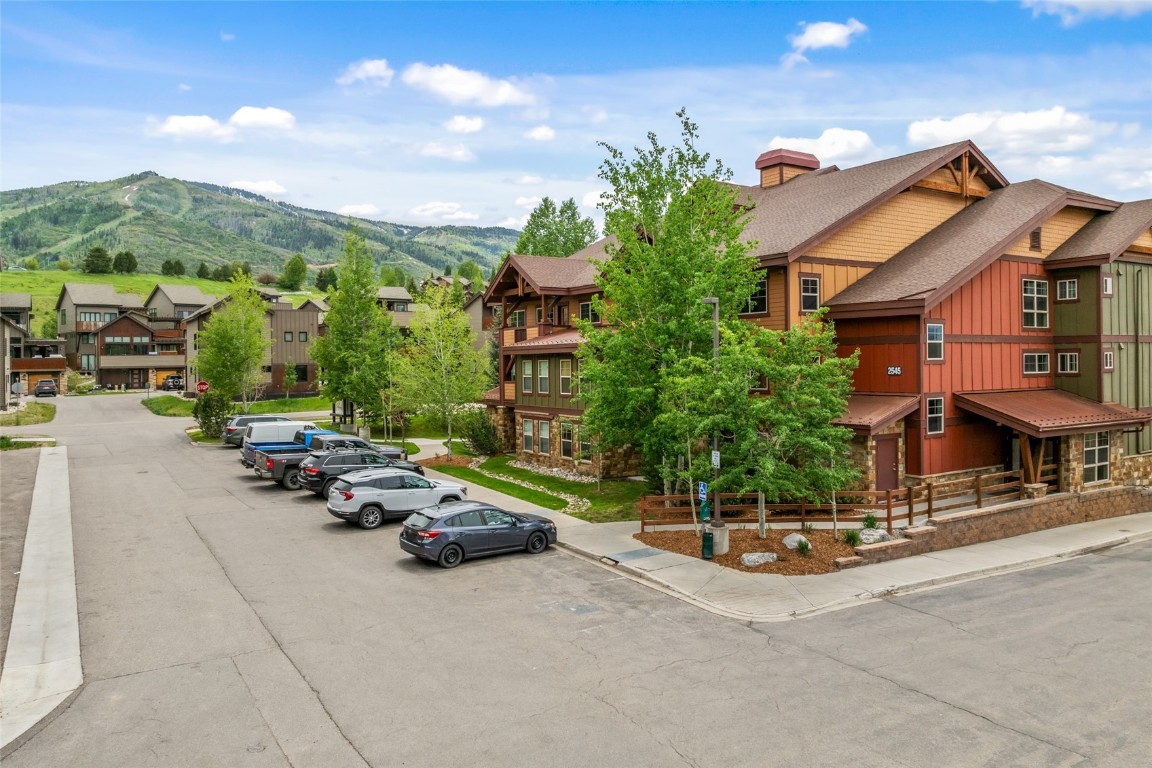 2545 Cattle Kate Circle, Unit 3207 Steamboat Springs, CO 80487 - Photo 2 of 42 a car parked in front of a house