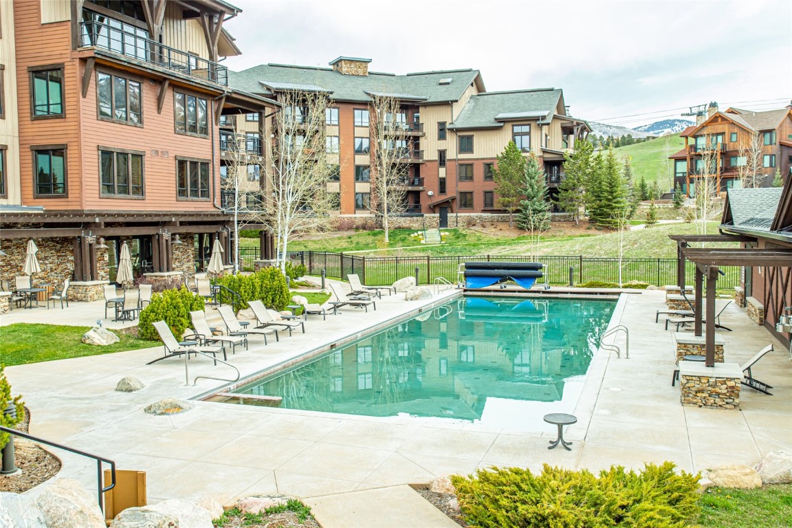 2545 Cattle Kate Circle, Unit 3207 Steamboat Springs, CO 80487 - Photo 26 of 42 a view of a house with a yard