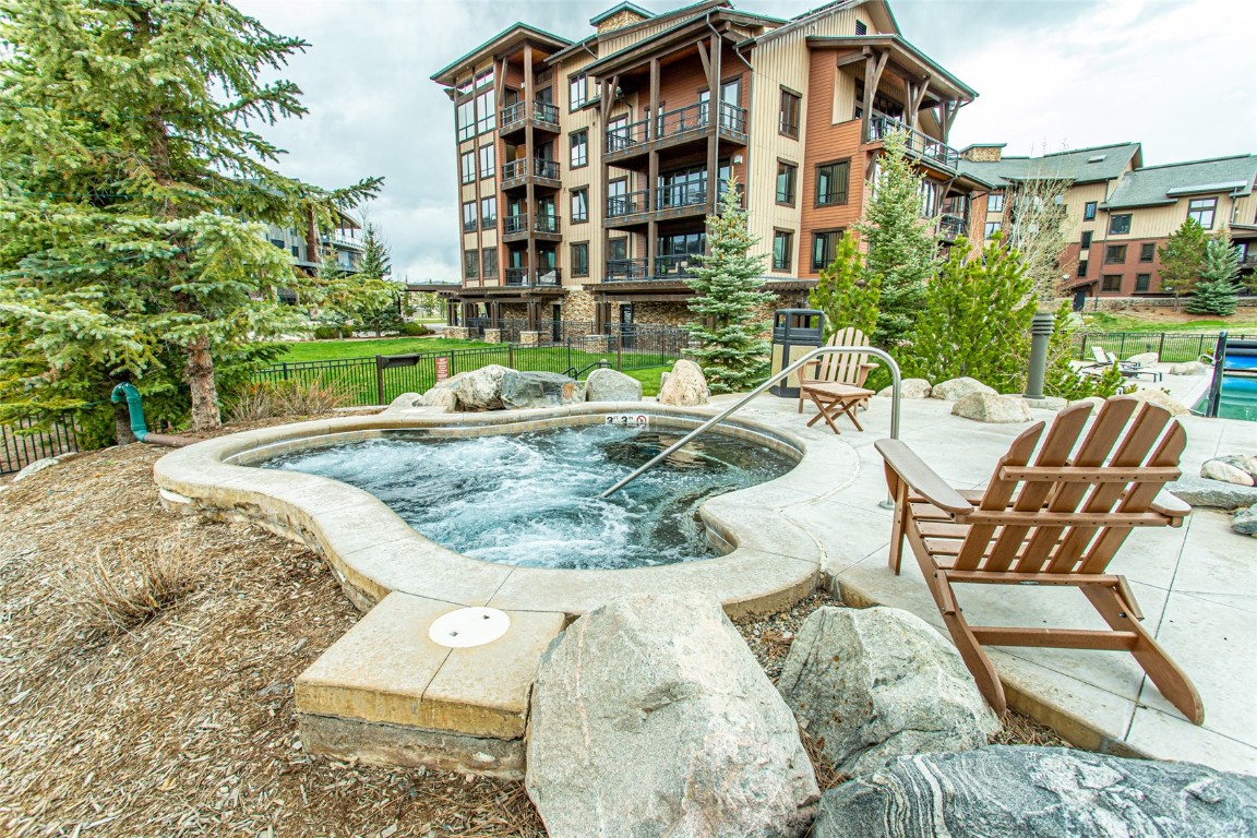2545 Cattle Kate Circle, Unit 3207 Steamboat Springs, CO 80487 - Photo 27 of 42 front view of a house with a yard