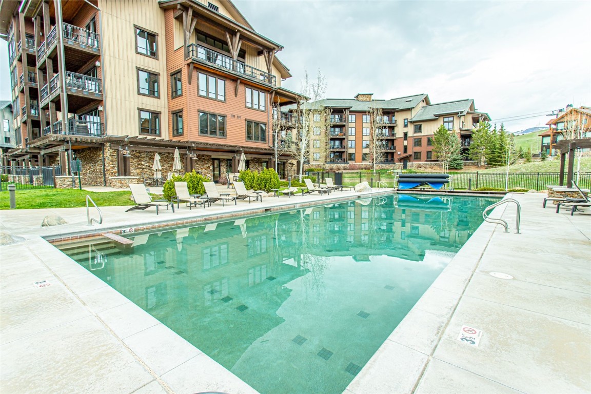 2545 Cattle Kate Circle, Unit 3207 Steamboat Springs, CO 80487 - Photo 31 of 42 a aerial view of a house with a yard and potted plants