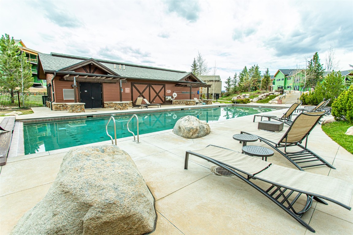2545 Cattle Kate Circle, Unit 3207 Steamboat Springs, CO 80487 - Photo 32 of 42 a view of a house with pool porch and wooden floor