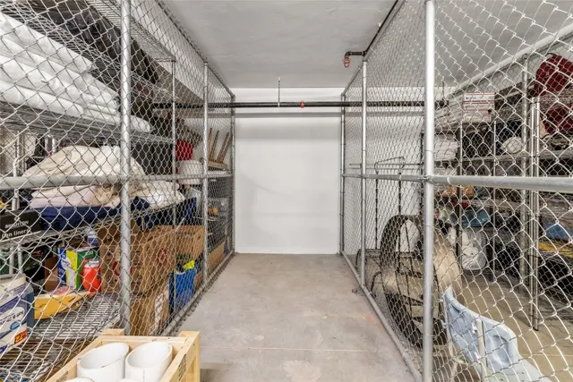 a view of a house with snow on the road